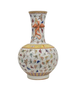 Famille Rose One Hundred Butterflies Vase, Guangxu Mark - A Chinese porcelain vase with a bulbous