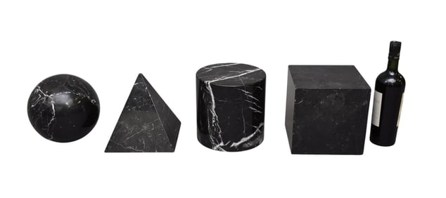 Four Geometric Black Marble Articles - Comprising a pyramid (9"h), cylinder, sphere and cube (each