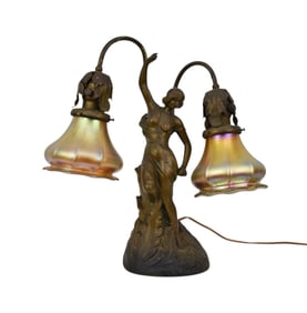 Art Nouveau Figural Lamp w/ Iridescent Glass Shades - An Art Nouveau period patinated metal lamp