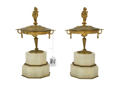 Pr. Bronze Tazzas Mounted on Onyx Bases each with Figural Finial Cover, covers may not be original,