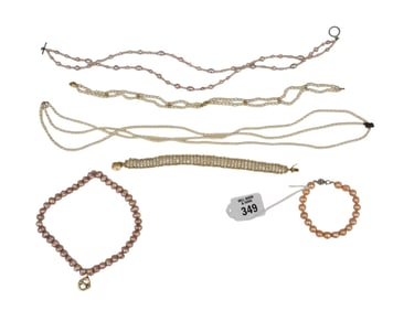 Lot of Pearl necklaces & Bracelets. 3 necklaces (1) with 14K gold clasp 14" - 16" and 3 bracelets 2