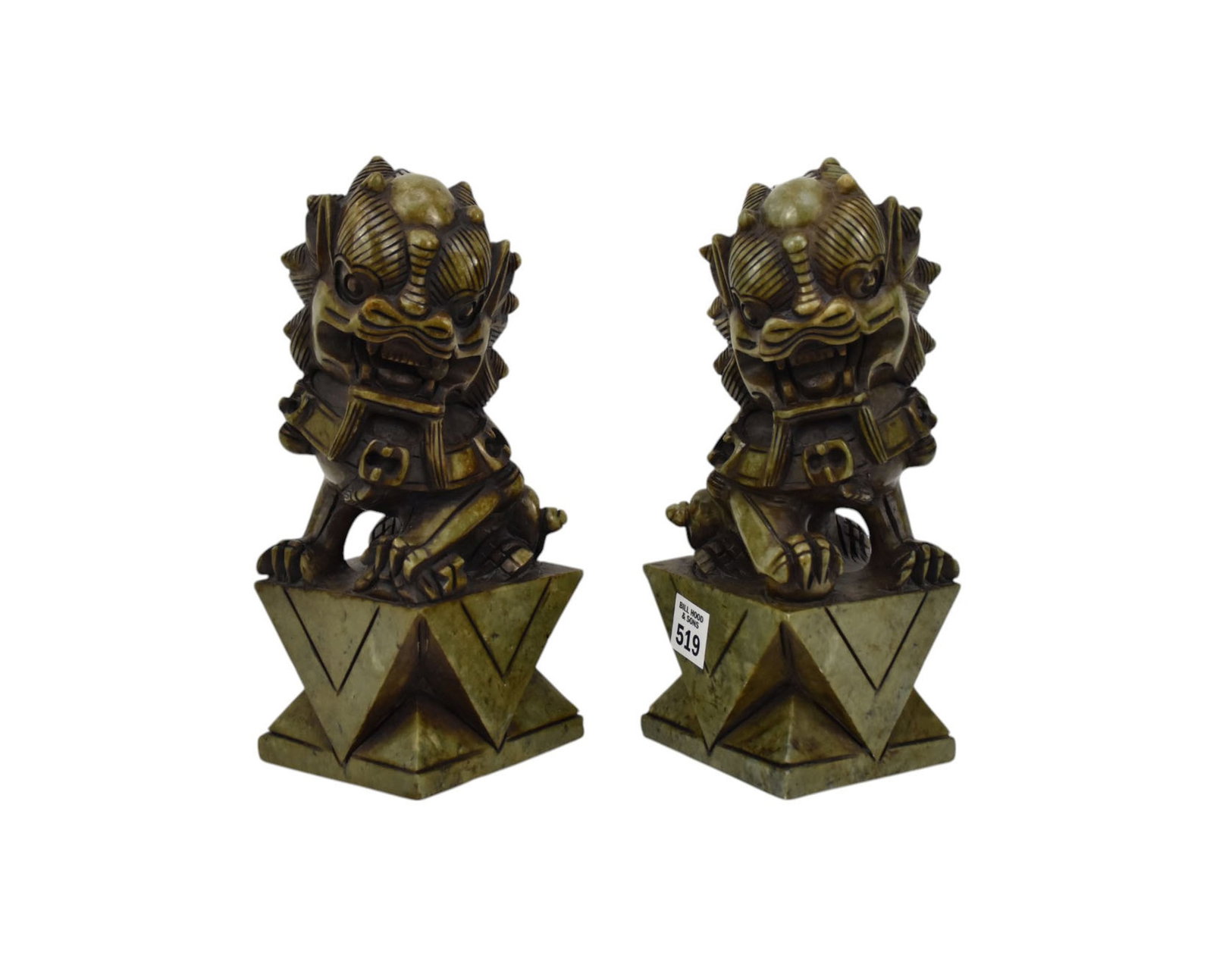 Green Hardstone Seated Foo Dogs on Plinth Bases: Green Hardstone Seated Foo Dogs on Plinth Bases