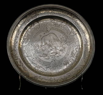 A Rare 1880s Tiffany & Co Sterling Native American Motif Charger - c. 1880s. A rare Tiffany & Co: A Rare 1880s Tiffany & Co Sterling Native American Motif Charger - c. 1880s. A rare Tiffany & Co charger plate with raised engraved decoration featuring Native American Indian themed scenes. Likely ba