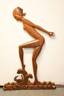 Art Deco Bather - Wood Lifesize Wall Sculpture of a Whimsical Female, Carved mahogany sculpture of a: Art Deco Bather - Wood Lifesize Wall Sculpture of a Whimsical Female, Carved mahogany sculpture of a bather female figure with toes dipped in waves and having a crab carved in relief resting on the wa