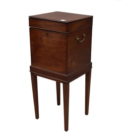 George lll Mahogany Cellaret, English ca. 1810. The molded square hinged top opening to a lead