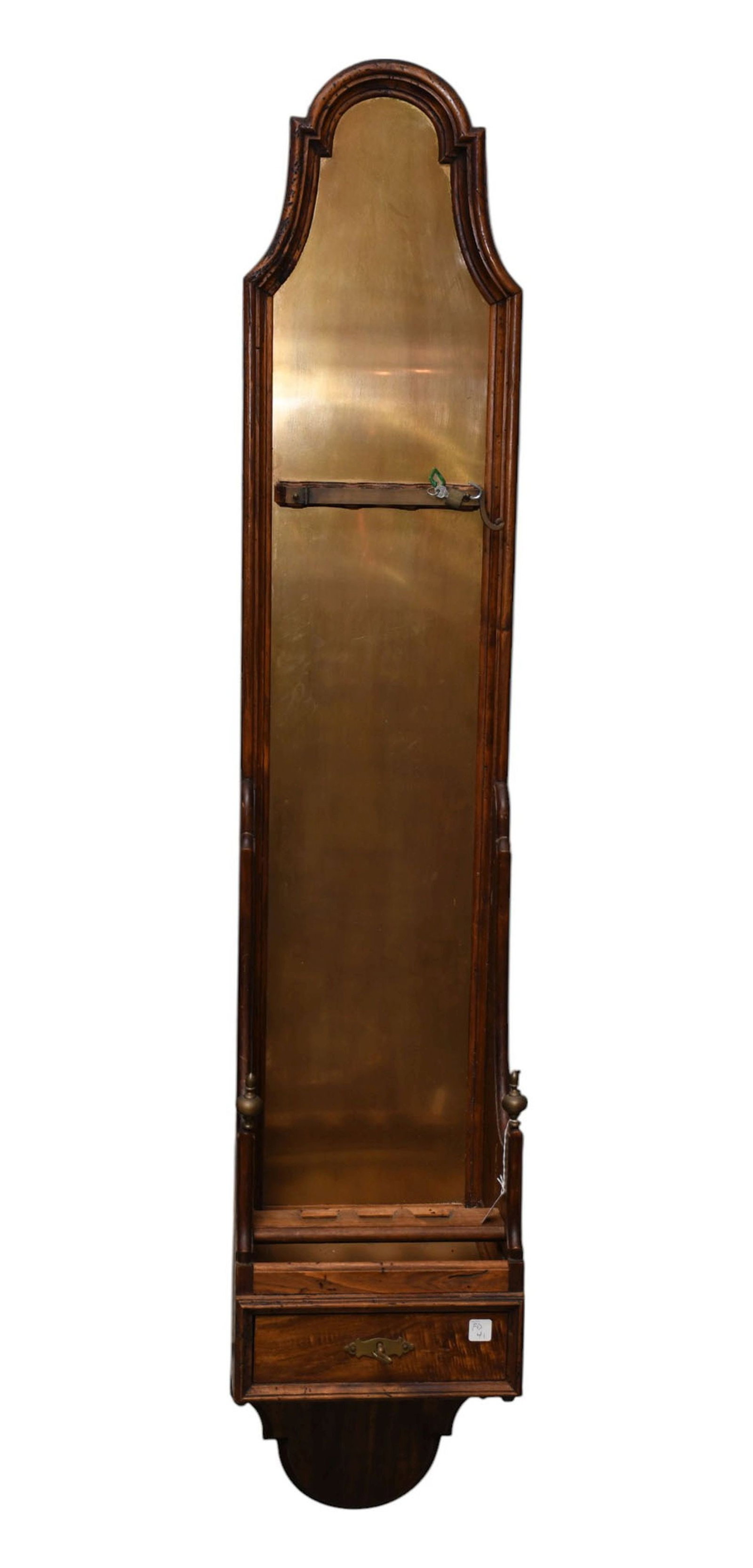 Gun Case with Shaped Brass Plated Back and Single Drawer, 73"H x: Gun Case with Shaped Brass Plated Back and Single Drawer, 73"H x 13"w ***If this item is not picked up by the Friday following the auction, it will be moved to offsite storage and pickup will be by ap