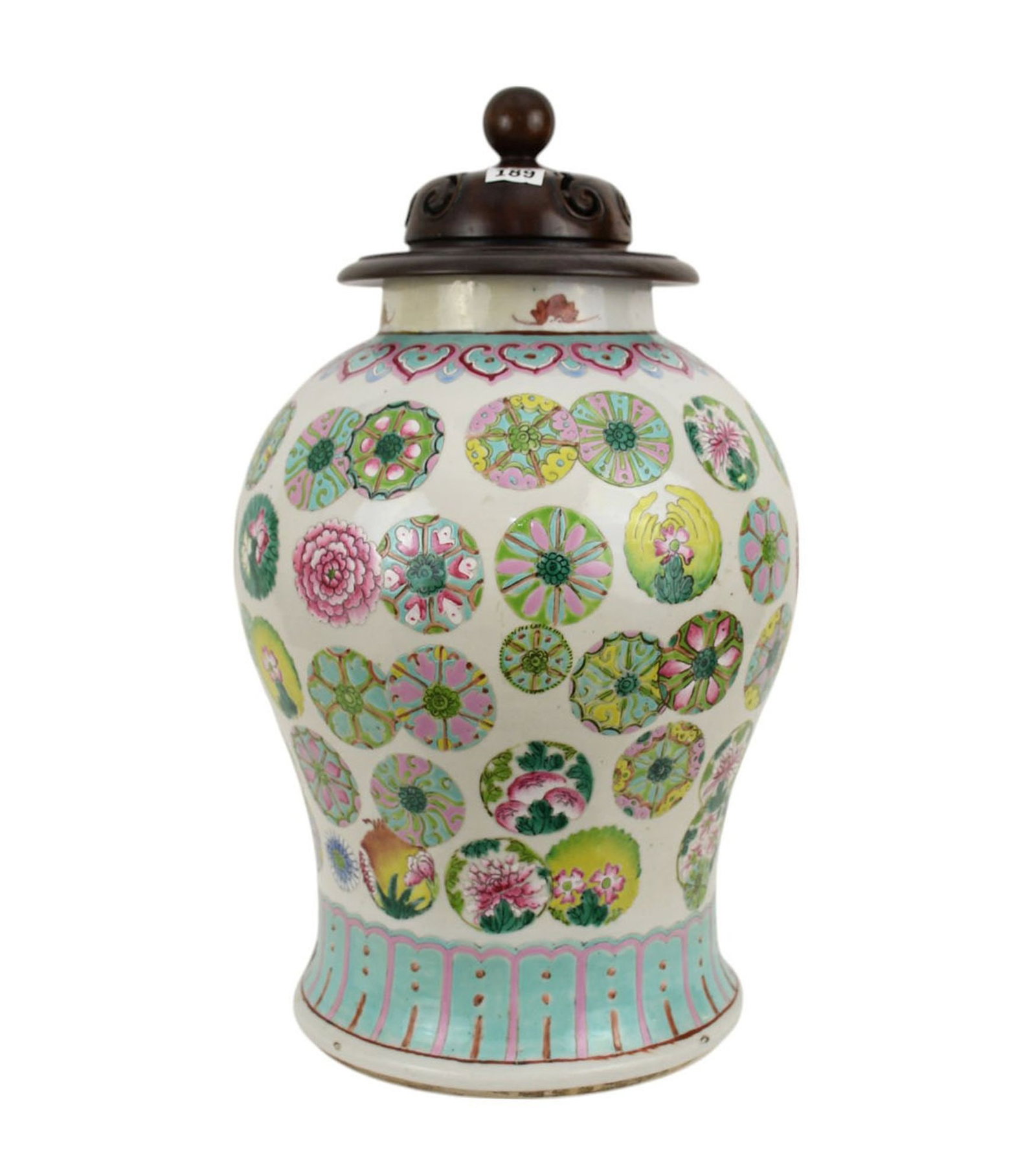 Chinese Famille Rose Baluster Vase, Late 19th Century, With replaced wood carved cover. The vase: Chinese Famille Rose Baluster Vase, Late 19th Century, With replaced wood carved cover. The vase ornamented with various circular motifs containing flowers, fruits and other vegetation. Having a decor