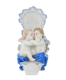 Meissen Porcelain Shoe with Cherubs - A porcelain shoe on pillow with two cherubs/putti. White and