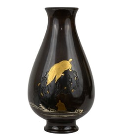 A pear-shaped footed vase with silver and gold turtles amongst waves. No apparent signature H. 7