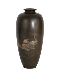 A mixed metal ovoid vase with three silver cranes. No apparent signature H. 7