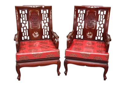 Pair of 20th century Chinese rosewood chairs with mother of pearl inlay. 37"h x 25"w x 26"d