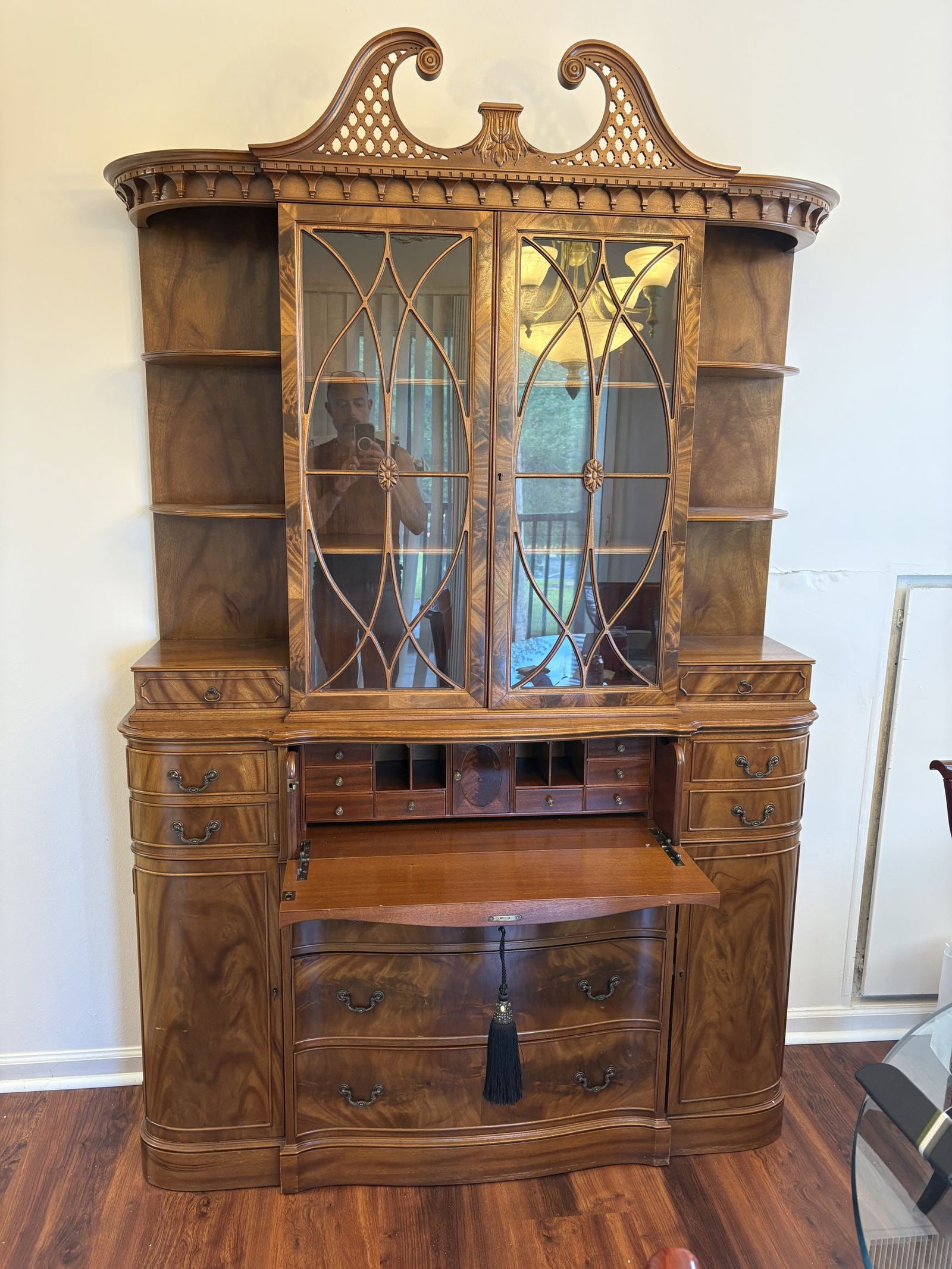 Mahogany Secretary Chippendale style with broken arch pediment over 2 paned doors , open shelfs at: Mahogany Secretary Chippendale style with broken arch pediment over 2 paned doors , open shelfs at sides, drop desk fitted interior flanked by doors and drawers
