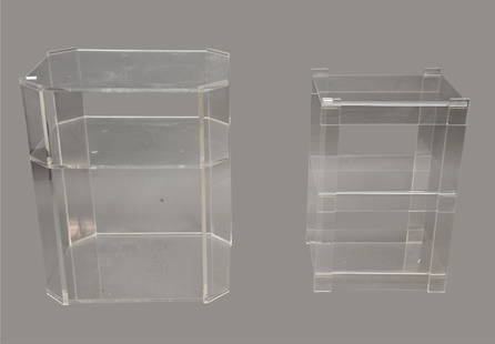 2 Lucite Side Tables, Smaller 24"h x 15 1/2"w x 13"w and Larger 26"h x 21"d x 16"d (some: 2 Lucite Side Tables, Smaller 24"h x 15 1/2"w x 13"w and Larger 26"h x 21"d x 16"d (some scratches) ***If this item is not picked up by the Friday following the auction, it will be moved to offsite st