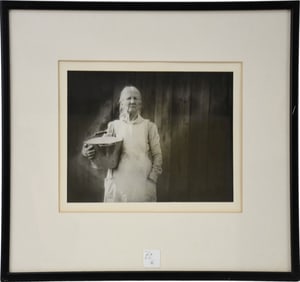 Laura Cunningham photo of Elderly Lady holding bucket, photo is 7 1/2 x 10 inches overall framed