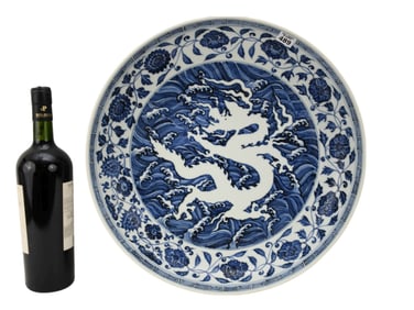 Chinese Blue & White Porcelain Dragon Charger - A large Chinese porcelain charger. Featuring a white