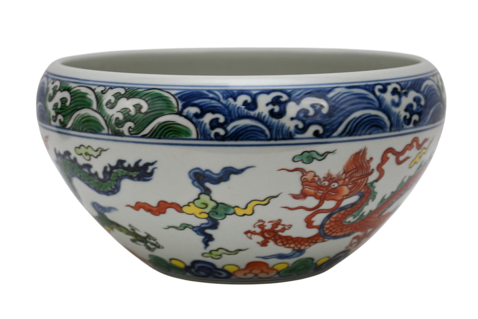 Chinese Wucai Porcelain Bowl, Dragon Motif - A deep tapered base bowl with an inverted rim. Wucai: Chinese Wucai Porcelain Bowl, Dragon Motif - A deep tapered base bowl with an inverted rim. Wucai style decoration with blue underglaze and red, yellow and green overglaze enamels. Dragon motif to ext