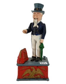Reproduction Uncle Sam Iron Mechanical Bank, 11"h x 4 1/2"w