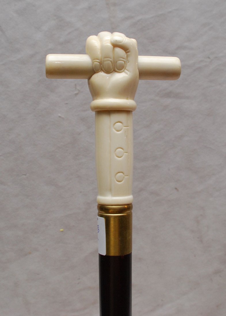 Walking stick with marine ivory fist handle, 39"L: Walking stick with marine ivory fist handle, 39"L