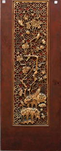 Cabinet door with gilt carved center panel, bird and floral motif, overall size 56-1/2 x 22 inches.: Cabinet door with gilt carved center panel, bird and floral motif, overall size 56-1/2 x 22 inches.