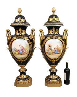 Pair Monumental Sevres Style Porcelain Urns - A pair of monumental French Sevres style contemporary: Pair Monumental Sevres Style Porcelain Urns - A pair of monumental French Sevres style contemporary covered urns. Each urn having a porcelain body with a hand-painted scene of young lovers on one face