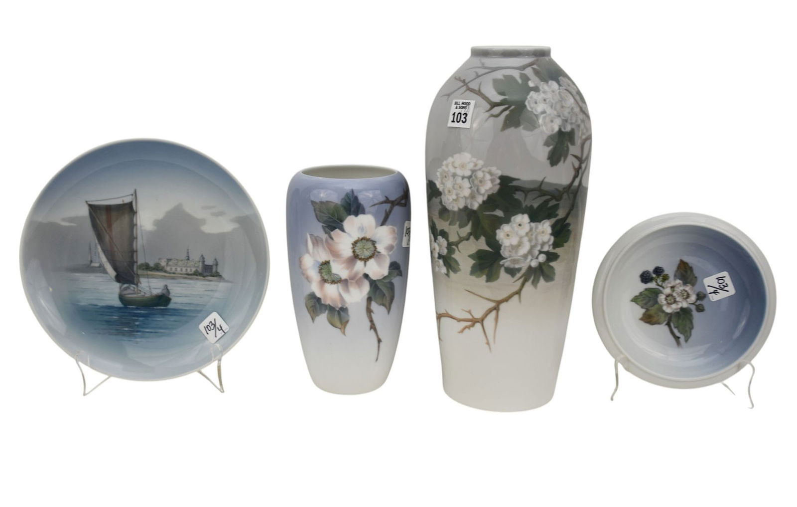 4 Pieces: 3 Royal Copenhagen Porcelains and One B+G. 2 Vases (14 12"h x 7"w & 9 1/2"h x 5 1/2"w): 4 Pieces: 3 Royal Copenhagen Porcelains and One B+G. 2 Vases (14 12"h x 7"w & 9 1/2"h x 5 1/2"w) AND 2 Plates (7 1/4"dia & 10"dia) The Tall Vase is B & G 14" tall.