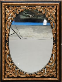 Carved Black & Gilded Wood Oval Frame Mirror, 43"h x 32 1/2"w