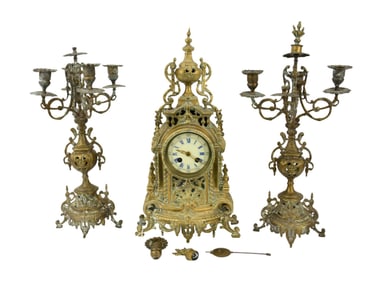 A French Rococo Style Brass Mantel Clock Garniture Set - C. 19th Century. A brass cased clock, time