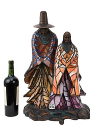 Rabbto style figural Native American stained glass table lamp.