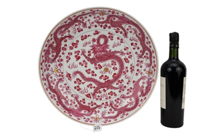 Chinese Porcelain Dragon Charger -  A large shallow porcelain bowl, dragon motif in cranberry red