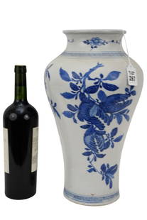 Chinese Blue & White Porcelain Vase - With blue underglaze decoration of foliate branches and peach: Chinese Blue & White Porcelain Vase - With blue underglaze decoration of foliate branches and peach and pomegranate fruit. No apparent marks. 14 7/8" h. Condition: Several stable spider cracks with a