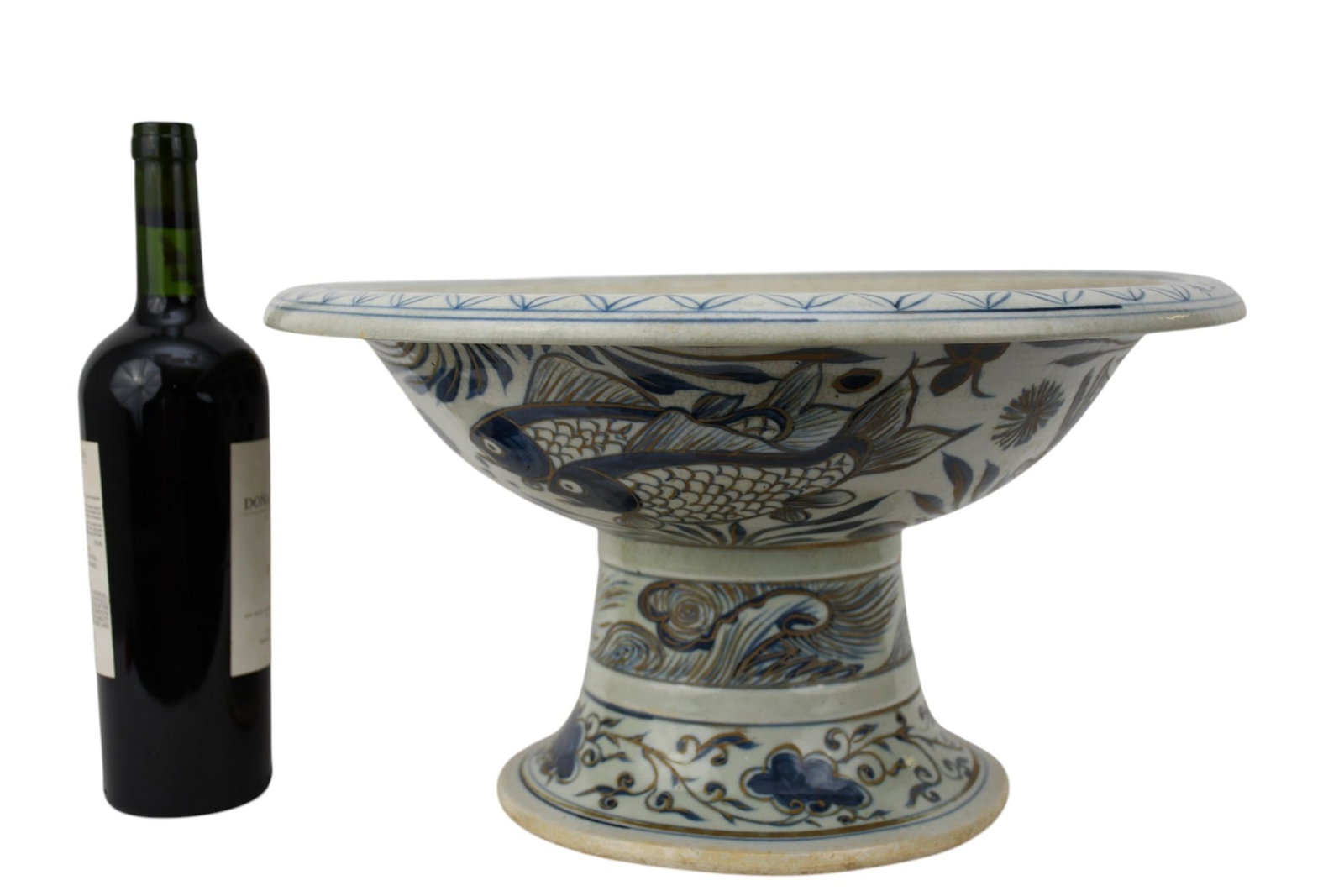 Chinese Blue & White Porcelain Pedestal Basin Bowl, Fish Motif - A large porcelain bowl with a: Chinese Blue & White Porcelain Pedestal Basin Bowl, Fish Motif - A large porcelain bowl with a flared everted rim, on a flared pedestal stem. Blue underglaze decoration featuring fish and aquatic flor