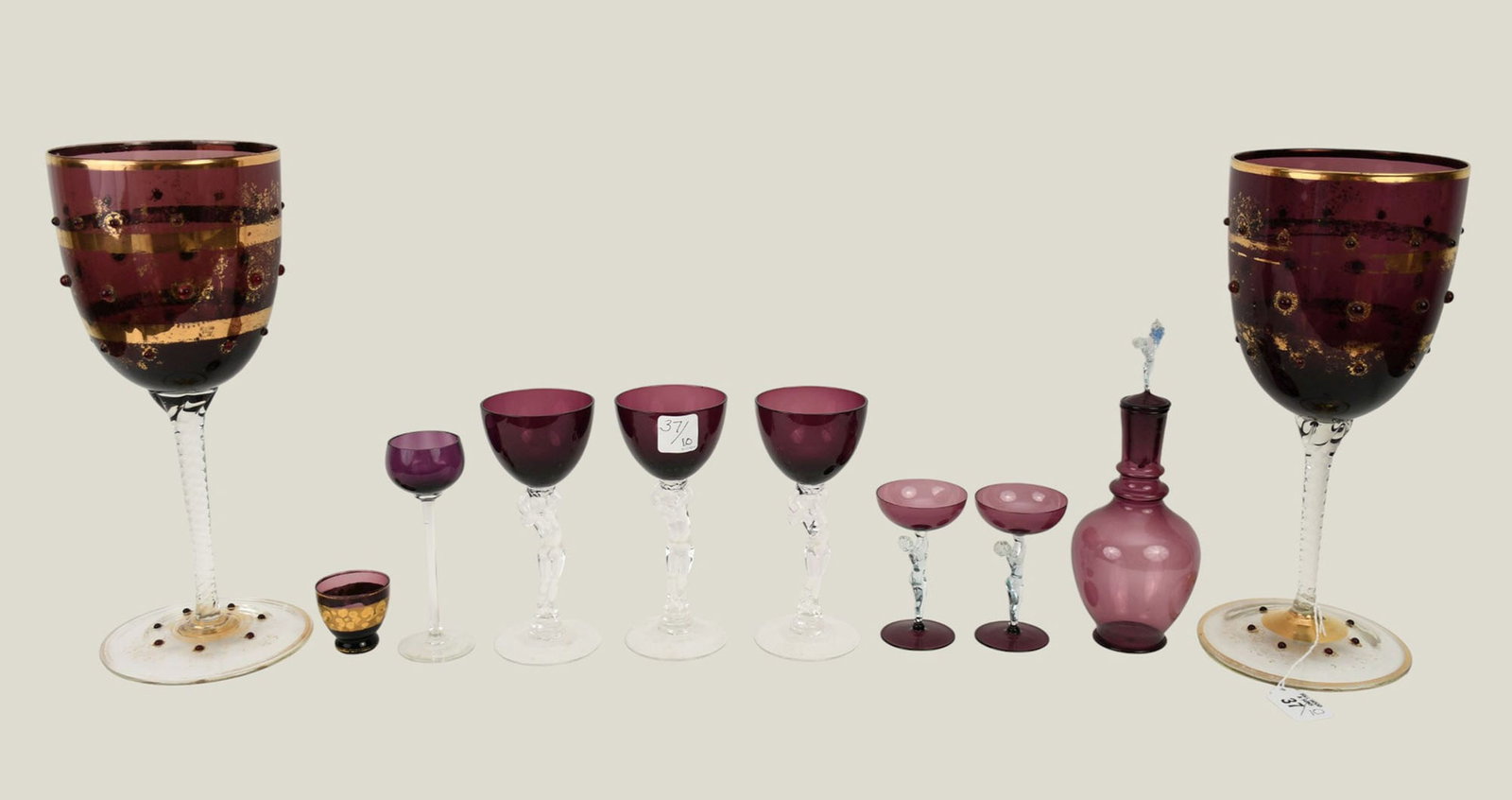 10 Vintage Pieces of Amethyst Glass, including 5 Cambridge Glass Nude Stems (2 sizes), Pair Chalices: 10 Vintage Pieces of Amethyst Glass, including 5 Cambridge Glass Nude Stems (2 sizes), Pair Chalices and Cambridge Decanter (9"h), Pair Chalices 13"h x 6"w