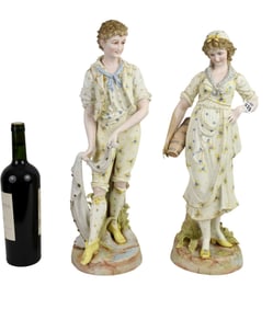 Pair Porcelain Boy & Girl Figures with Fancy Matching Attire, 19"h x 7"w (some losses)