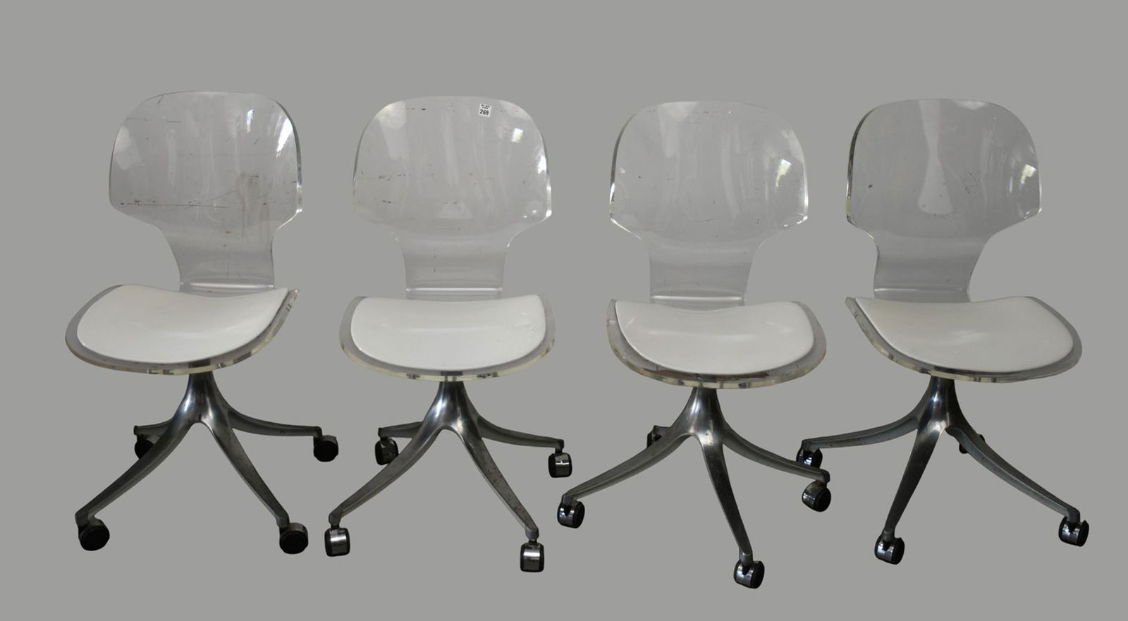 4 Lucite Office Chairs, White Leather Seats, Chrome Bases on Wheels, 34"h x 17"w x 18"d (bases show (1 of 6)