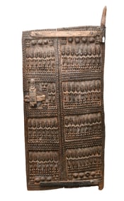 African Door- Dogon, 20th century Carved door panel from a granary, 60 x 29 ½