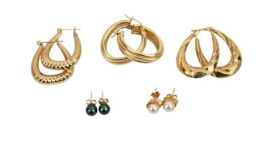 14K Yellow Gold Earring Lot. Wt. 15.6 grams 3 pairs of hoop earring and 2 pairs of stud earrings.