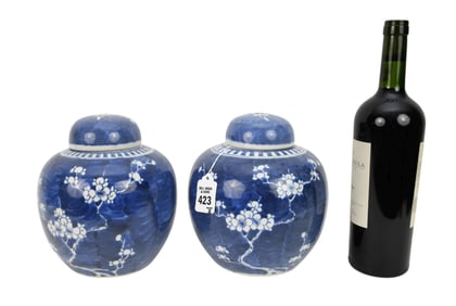 Pair Chinese Blue & White Porcelain Ginger Jars - A pair of covered ginger jars, blossoming branches