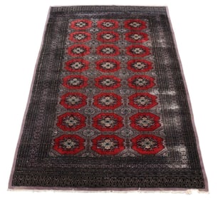 Bokhara Rug, worn on one side low pile. 8.0 x 5.4 feet.