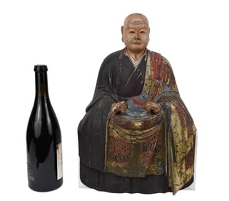 An Edo Period Painted Wood Figure of Seated Monk - Japanese, Edo Period, c. 18th-19th century. A