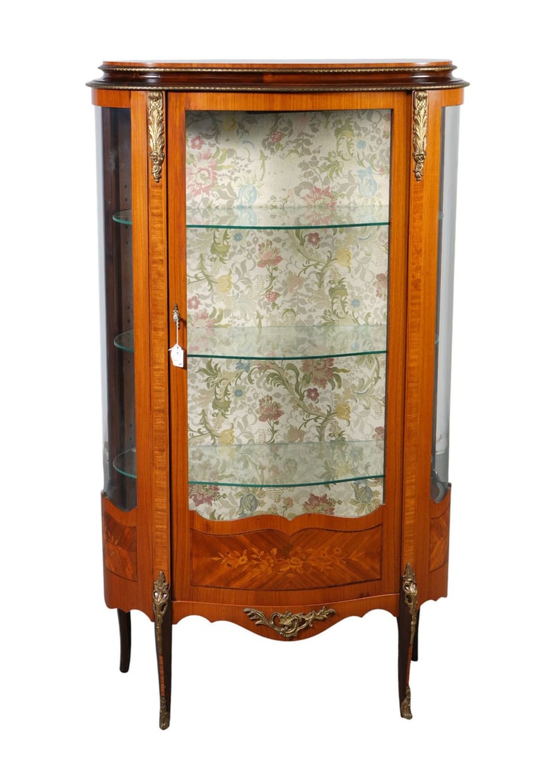 French Style Bowed Glass Vitrine, Gilt Metal Accents & Inlay Bowed Panels At Bottom, Fabric Lined: French Style Bowed Glass Vitrine, Gilt Metal Accents & Inlay Bowed Panels At Bottom, Fabric Lined Interior with 3 Glass Shelves, 55"h x 29"w x 17"d ***If this item is not picked up by the Friday follo
