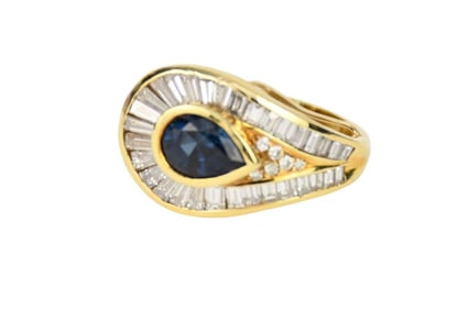 18K Yellow Gold Diamond Sapphire Ring. Size 7.5 wt. 16.4 grams. Sapphire tear drop 10mm x 8mm with