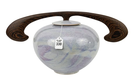 Huntley Pottery Flambe Jar with Wood Handle - C. 1989. A large covered jar with flambe style mottled