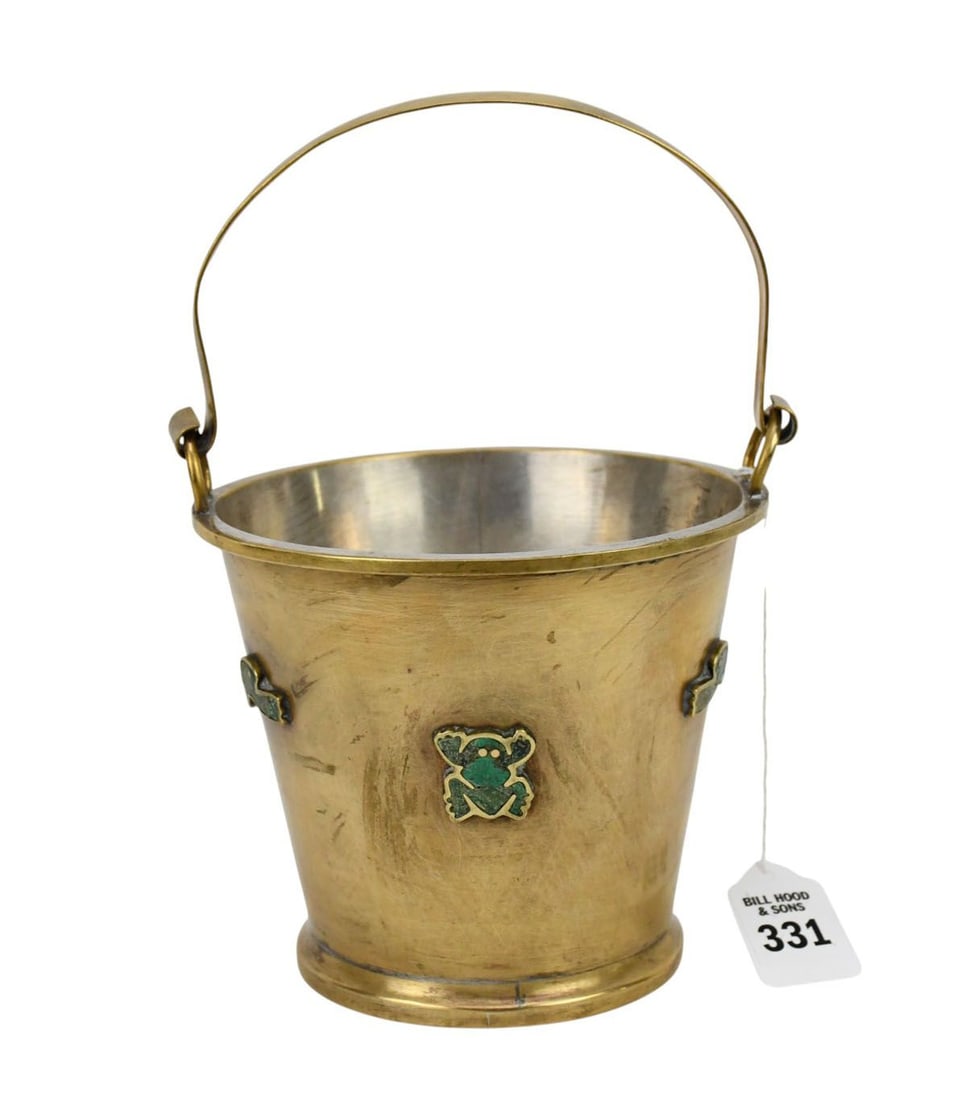 A Vintage Los Castillo Taxco Ice Bucket Malachite Frogs - A small brass ice bucket with hinged: A Vintage Los Castillo Taxco Ice Bucket Malachite Frogs - A small brass ice bucket with hinged handle, silver toned interior. The sides with stylized frogs inlaid with malachite or turquoise greenston