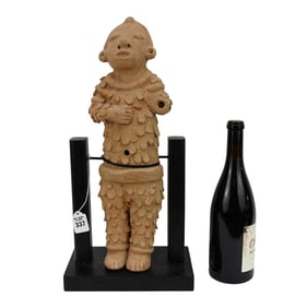 Pre-Columbian Terracotta Figure of Xipe Totec - Mexico. Earthenware hollow pottery figure of the