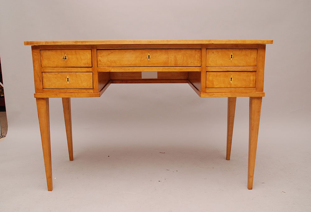 Biedermeier birch writing desk, circa 1815 (31"h x 46"w: Biedermeier birch writing desk, circa 1815 (31"h x 46"w x 21 1/8"d) and Biedermeier walnut chair, early 19th c.