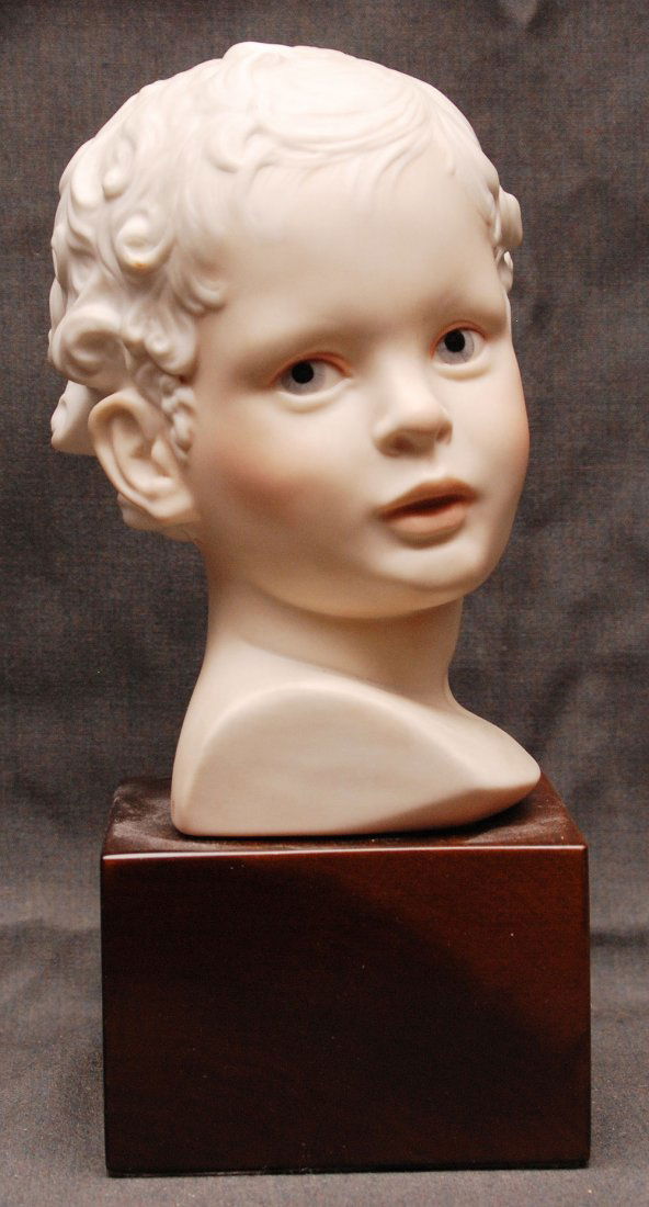 Cybis porcelain, impressed 1974, bust of child's head o: Cybis porcelain, impressed 1974, bust of child's head on wood block, 9 1/2"h