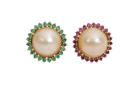 2 - 14K Yellow Gold Mabe Pearl Rings. 1 with ruby accents and the other with emerald accents. Size 7
