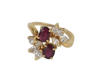 14K Yellow Gold Diamond Ruby Ring. 8 Marquise diamonds approx. .08 each SI 1-2 H and 2 Rubies. Size