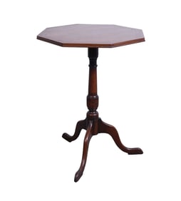 19th Century octagonal mahogany candlestand side table on tripod legs some inlays; age split on top.