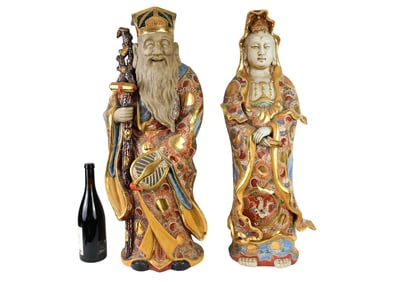 Two Japanese Kutani Moriage Immortal Figures - Two Japanese Kutani pottery figures decorated with